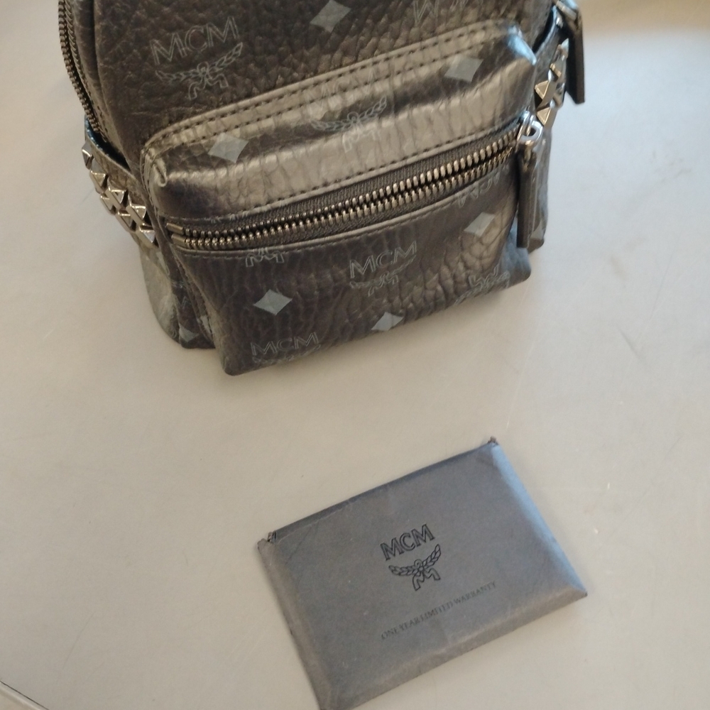 MCM Silver Backpack with Studded Details